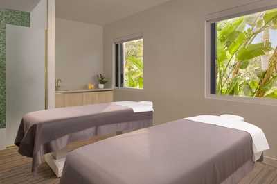 Natural light streams into the massage room, where the Spa's Wellness Club team has thought of everything