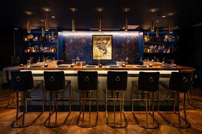 Enjoy a meal or drink at Sushi by Bou.