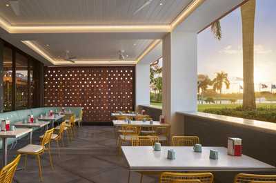 Sip your morning coffee on the terrace, with the fairways glowing green in the background