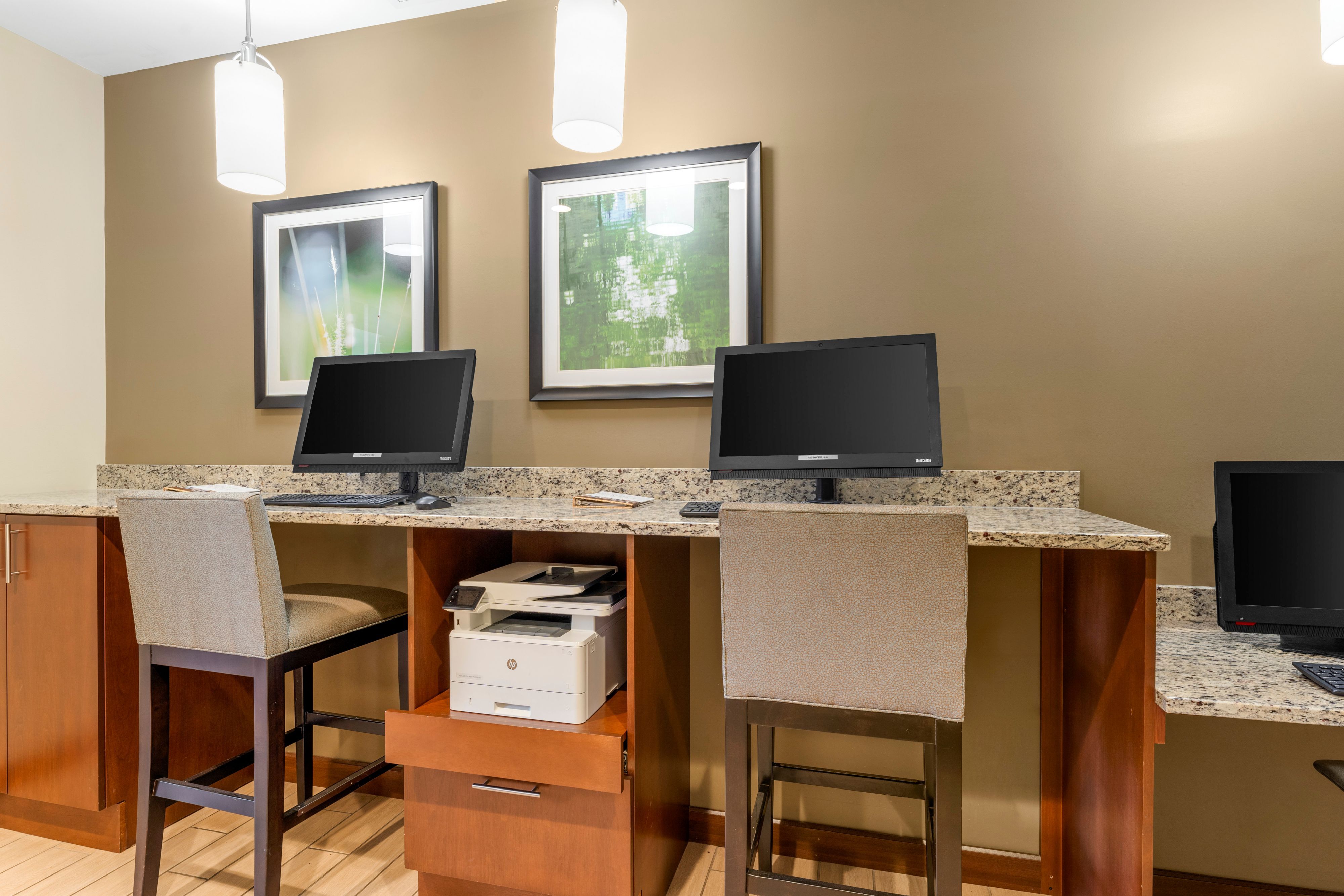 image Dedicated business center with computers and printing services.
