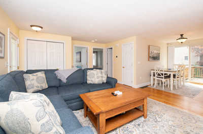 Relax in the comfortable living space, where cozy décor and a dining area blend for a welcoming ambiance.