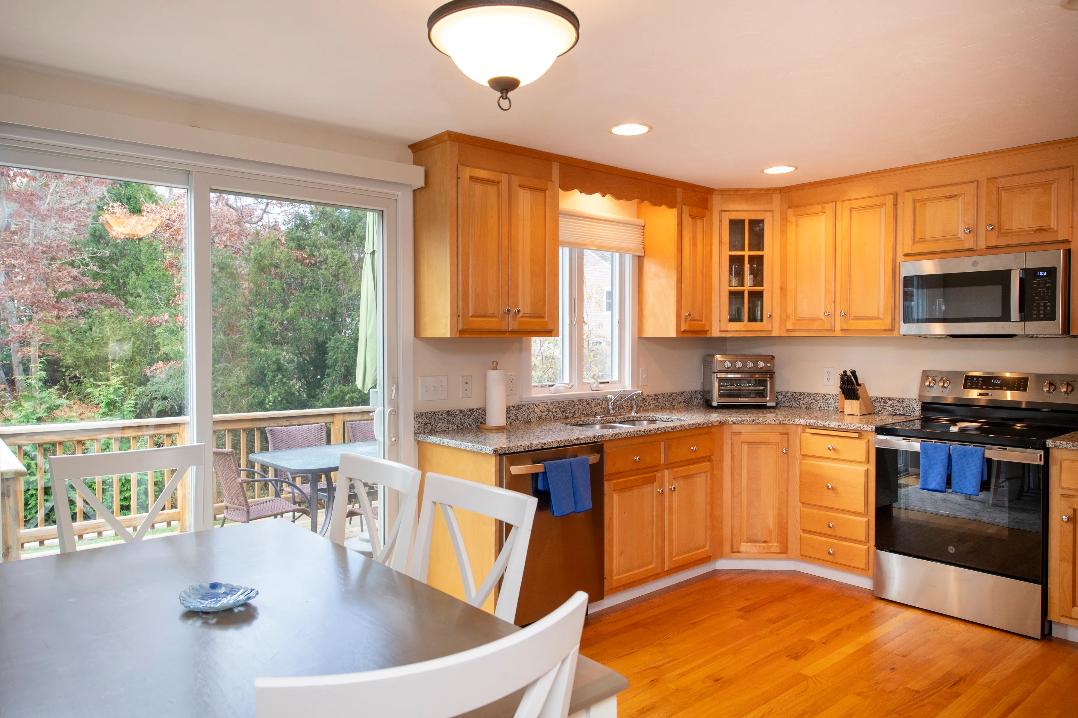 image Step into a cozy dining area where meals are enjoyed with natural light and views of the serene outdoor patio.