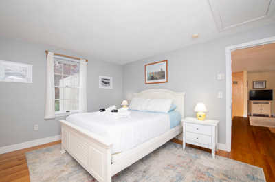 Enjoy restful nights in this tastefully decorated room, complete with plush linens and charming coastal accents.