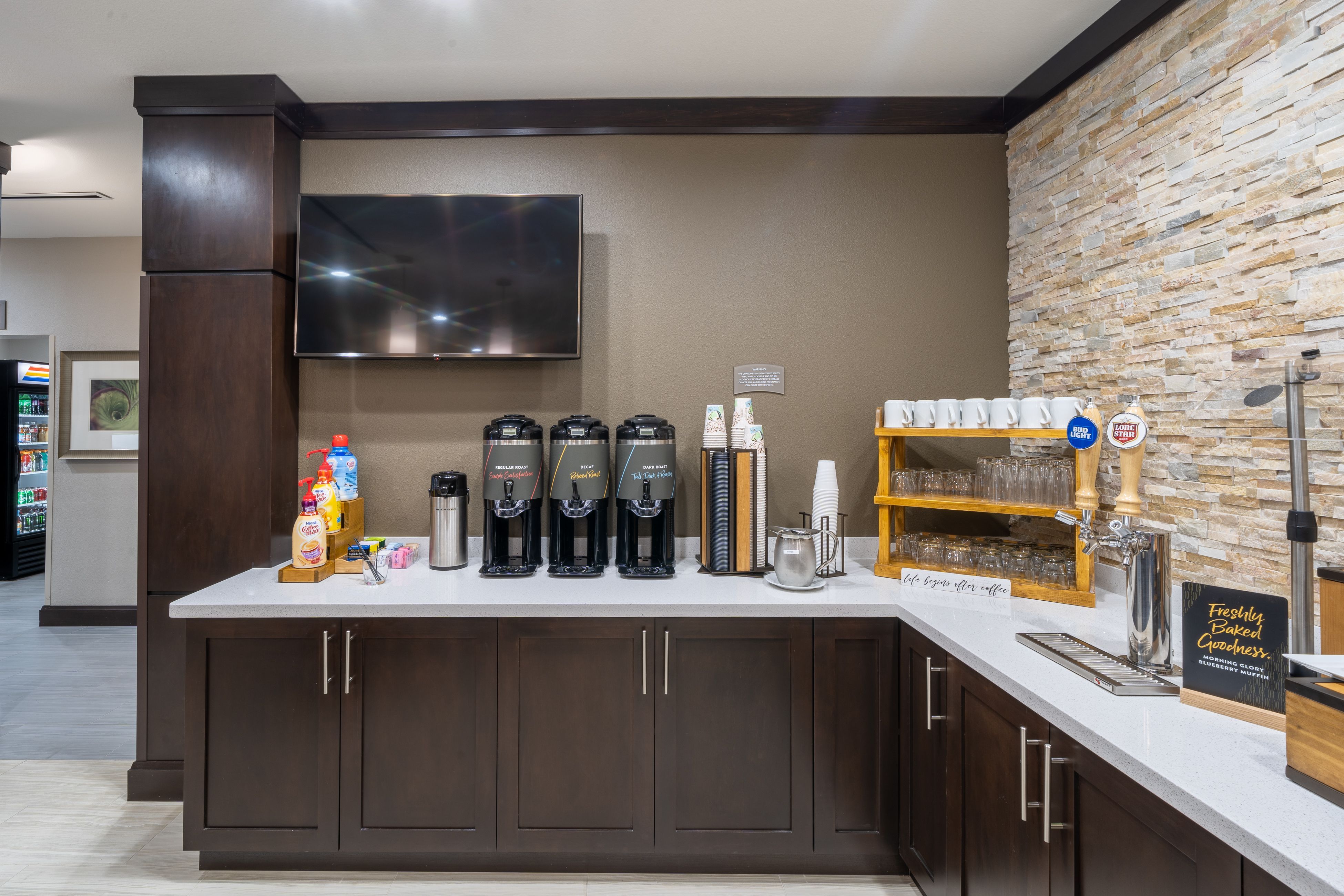 image Pour your perfect morning brew from a selection of fresh coffee and beverages, just steps from your suite.