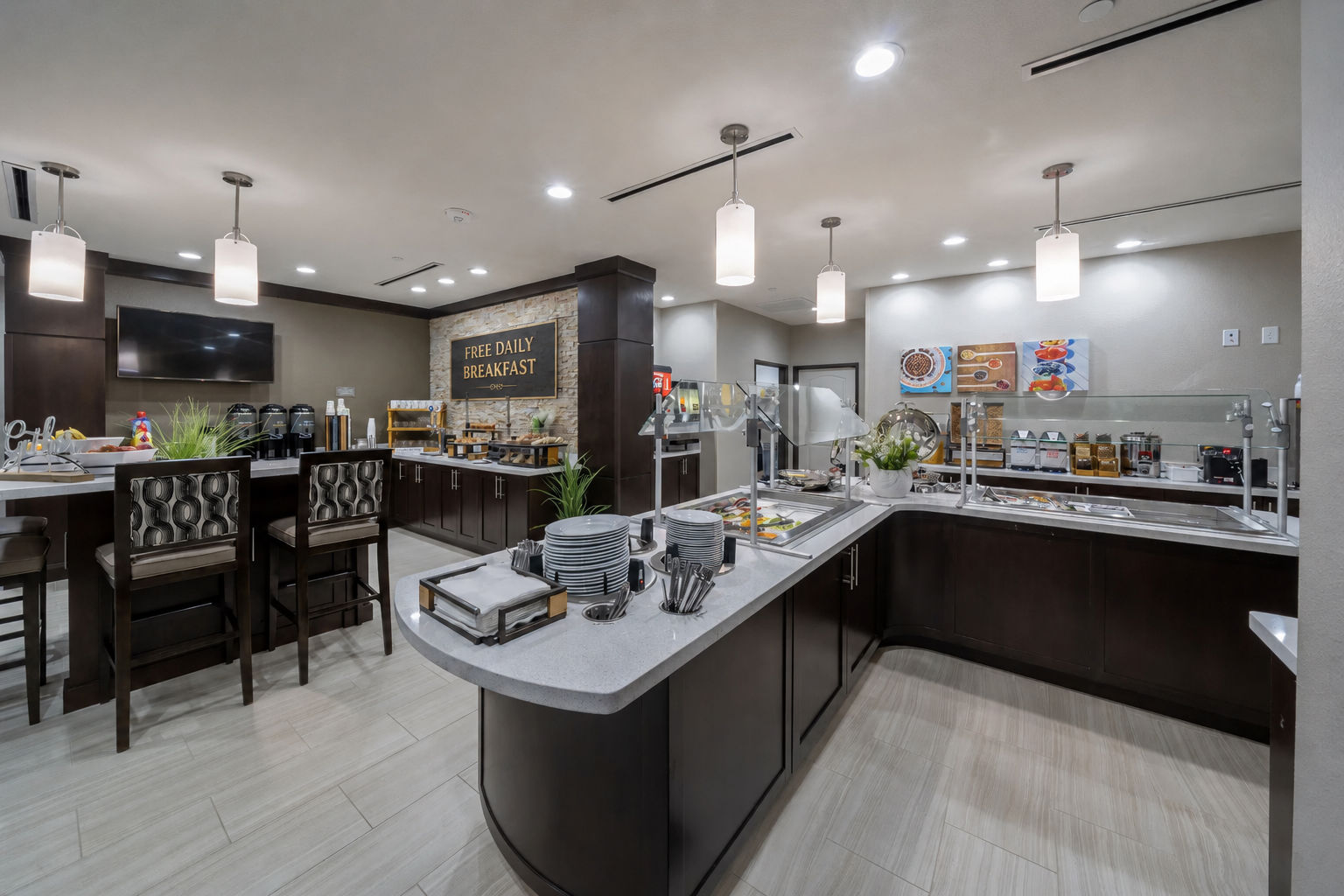image Savor a delicious free breakfast in a stylish dining area, complete with modern seating and fresh decor.