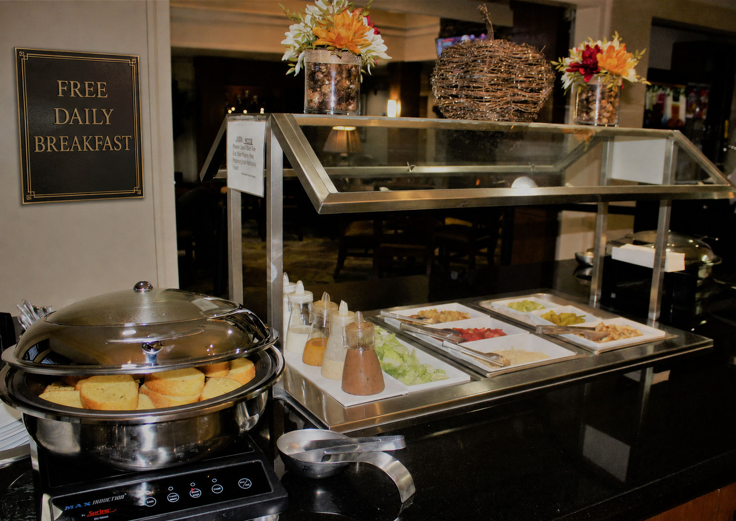 image Complimentary hot breakfast buffet served daily in the lobby dining area.