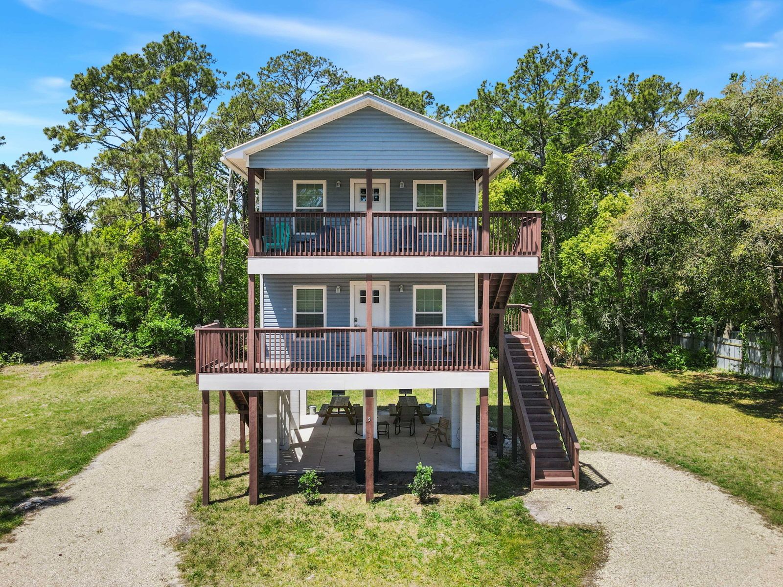 image Your private coastal retreat is a modern elevated home surrounded by Florida's natural beauty, just minutes from Apalachicola Bay and St. George Island.
