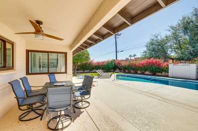 Enjoy meals alfresco by the poolside, surrounded by blooming bougainvillea and the warm Arizona sun.
