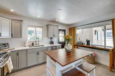 Cook up your favorites in this modern kitchen, complete with sleek appliances and ample natural light.
