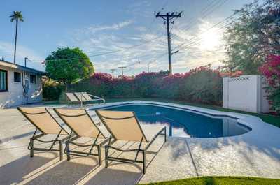 Lounge by the pool on sun-kissed chairs, perfect for soaking up the Arizona sunshine.