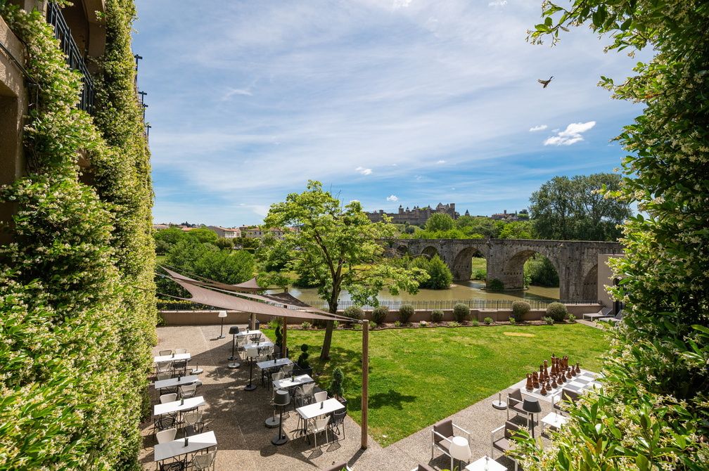 image Floor-level terrace view of Carcassonne's fortified walls — the UNESCO site is a 2-minute walk.
