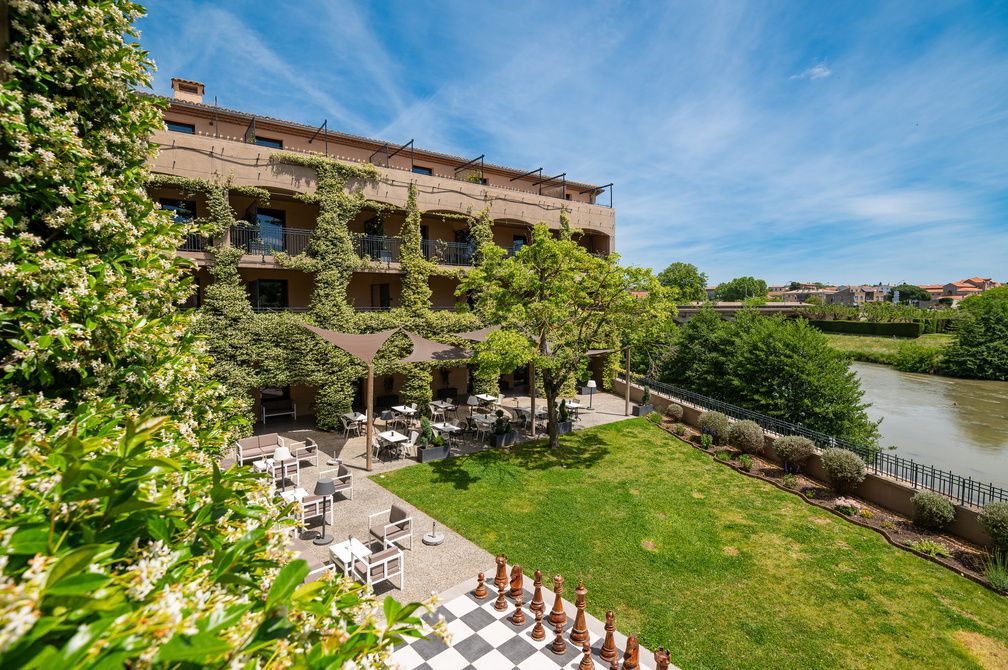 image Welcome to Carcassonne — the terrace garden overlooks the Aude River, 100 metres from the UNESCO medieval city.