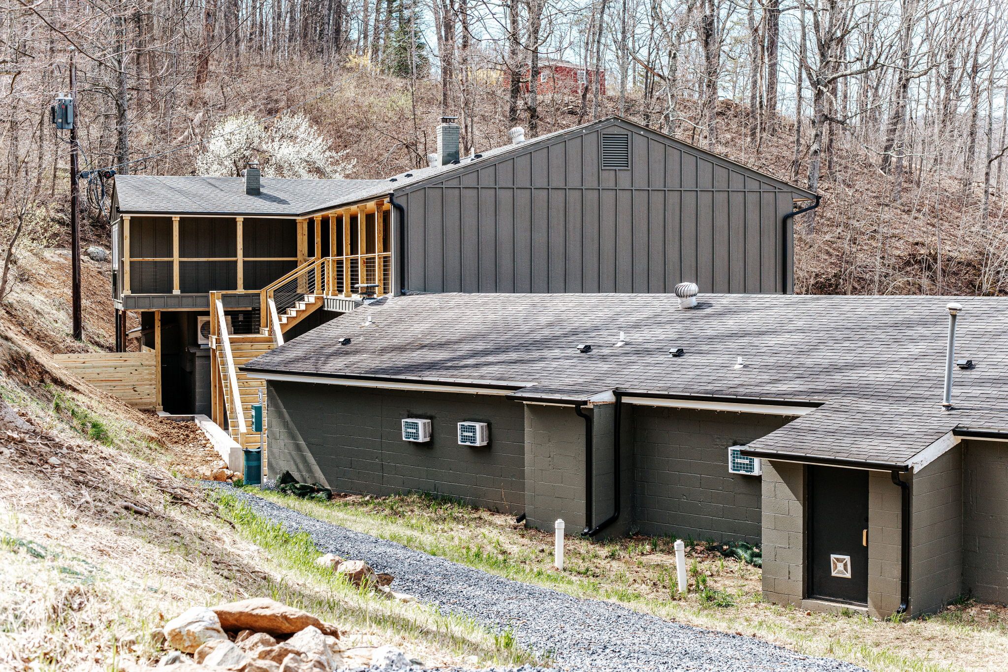 image Charming lodge exterior nestled among the trees on Afton Mountain.