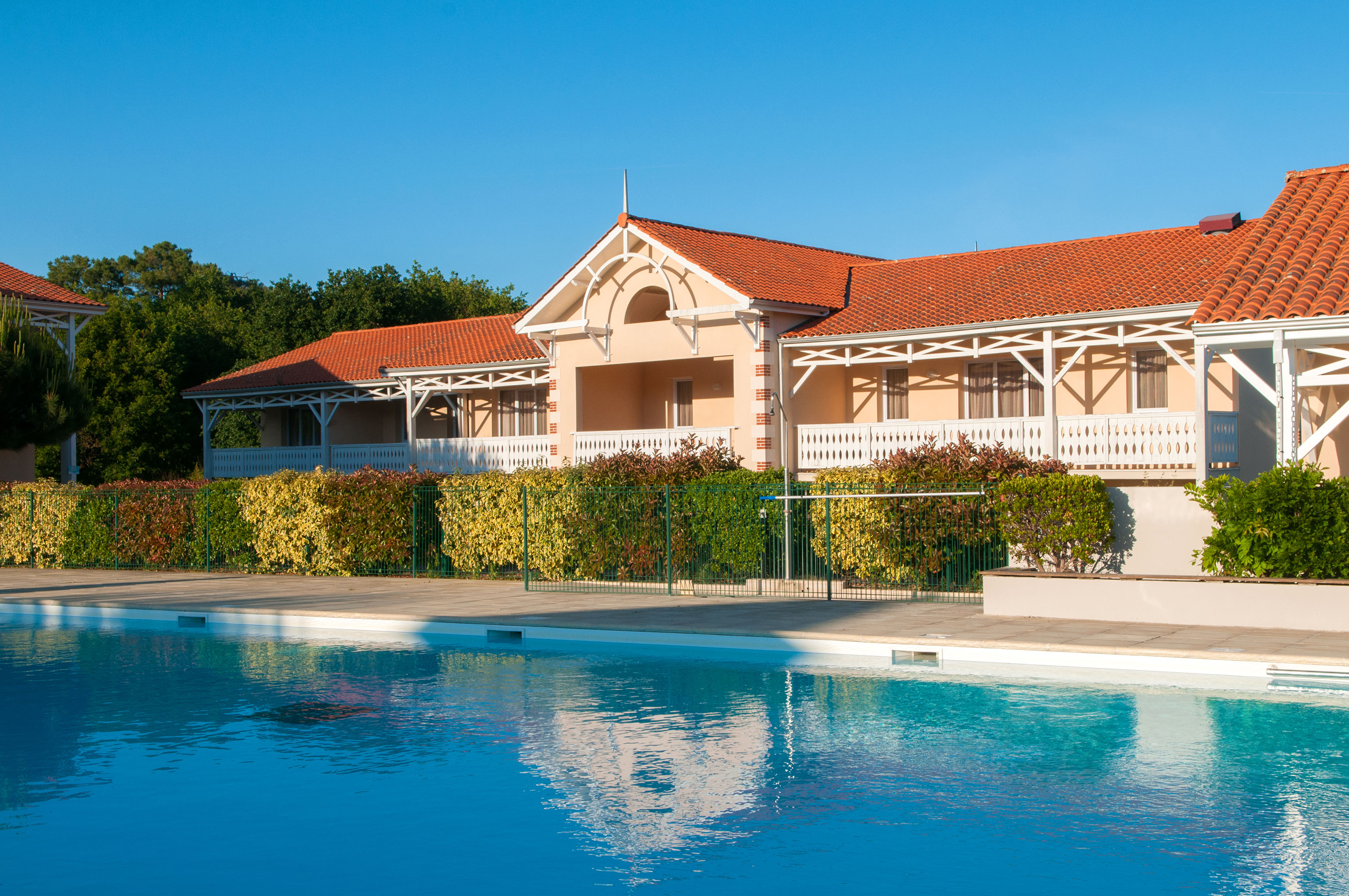 image The heated outdoor pool set among lush park grounds, open from April to mid-September.