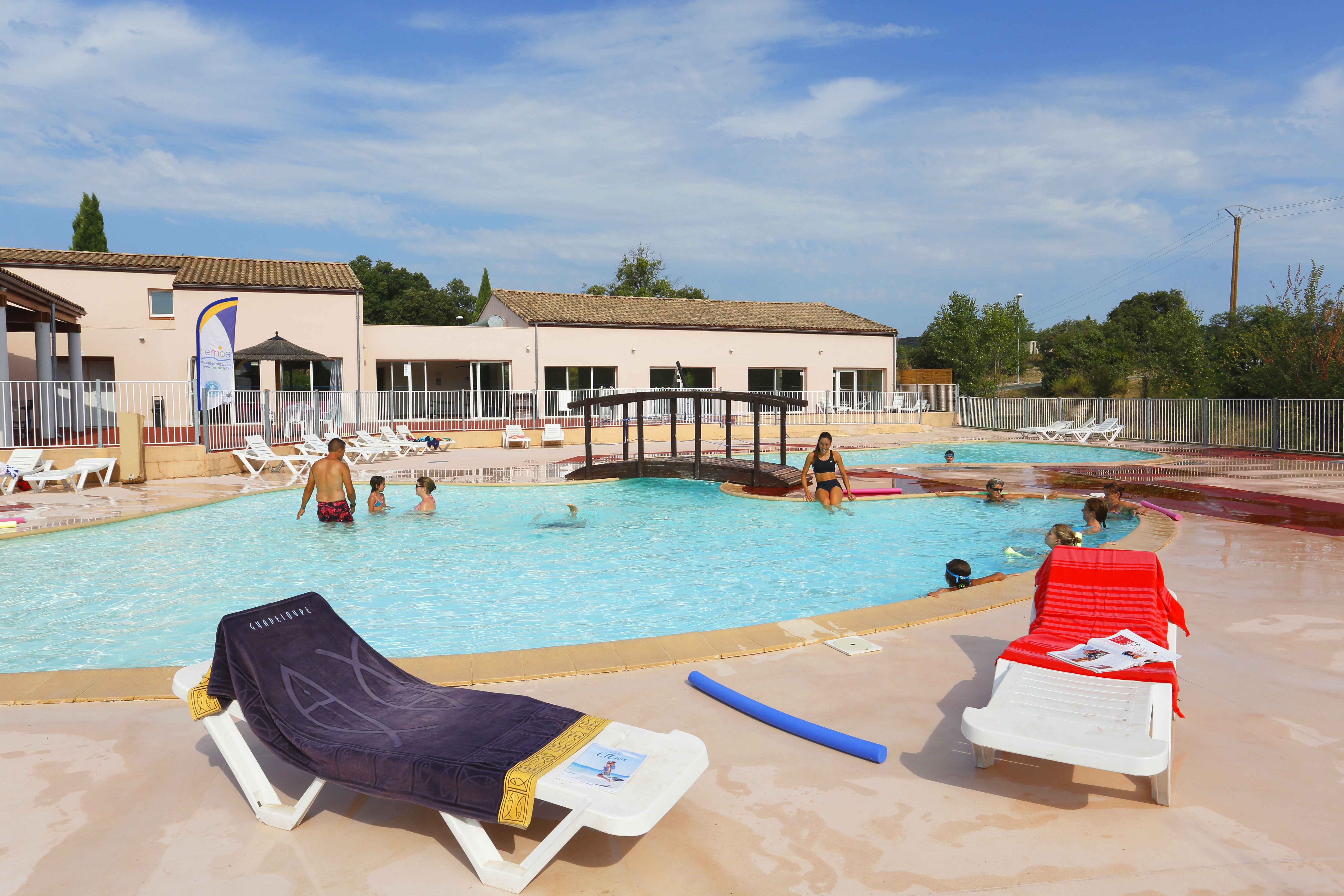 image Sun loungers beside the outdoor pool invite guests to soak up the southern French sun on this peaceful 6-hectare estate.