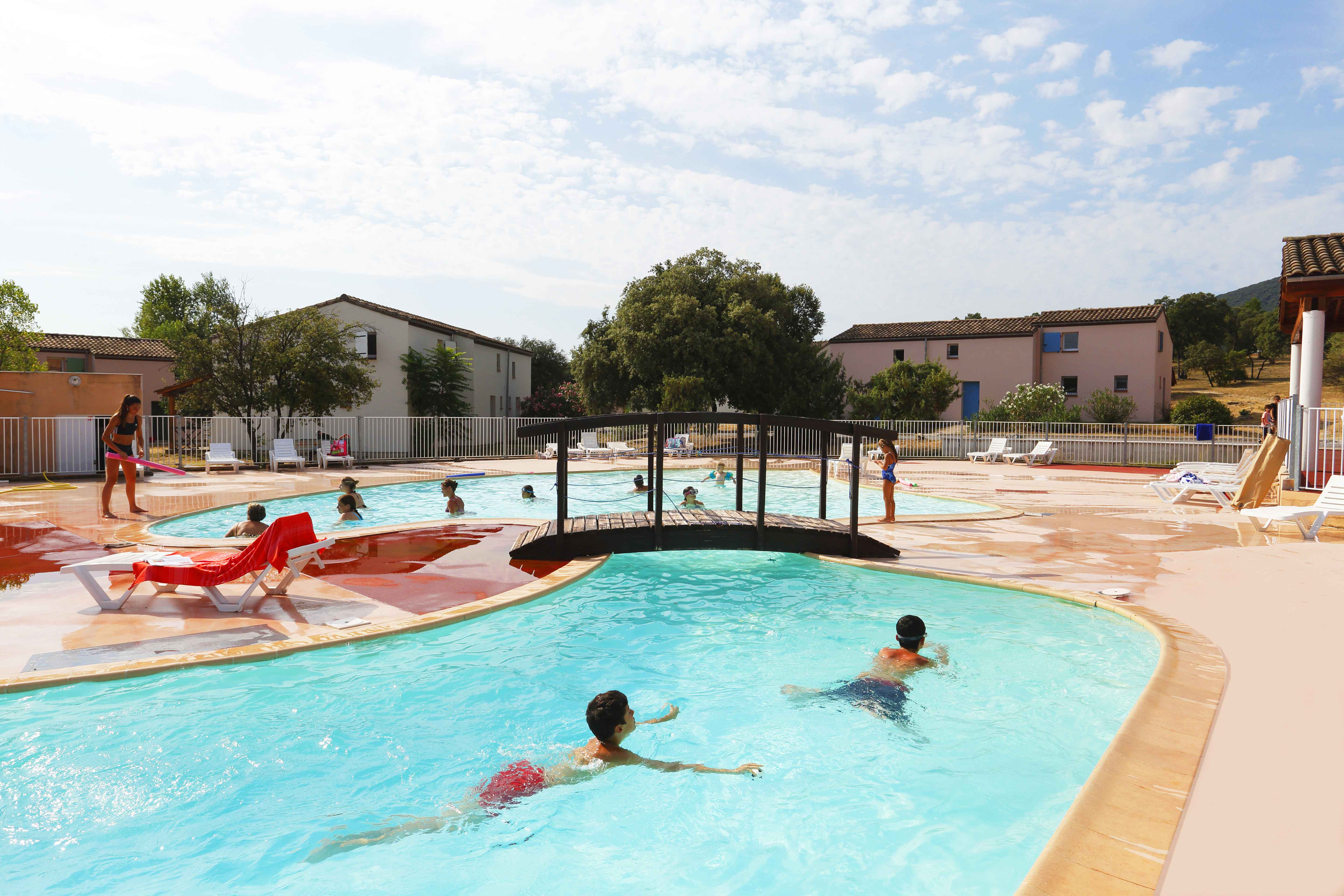 image Guests enjoy a refreshing dip in the outdoor pool — the ideal way to unwind after a day exploring the medieval village of Sauve or the Cevennes gorges.