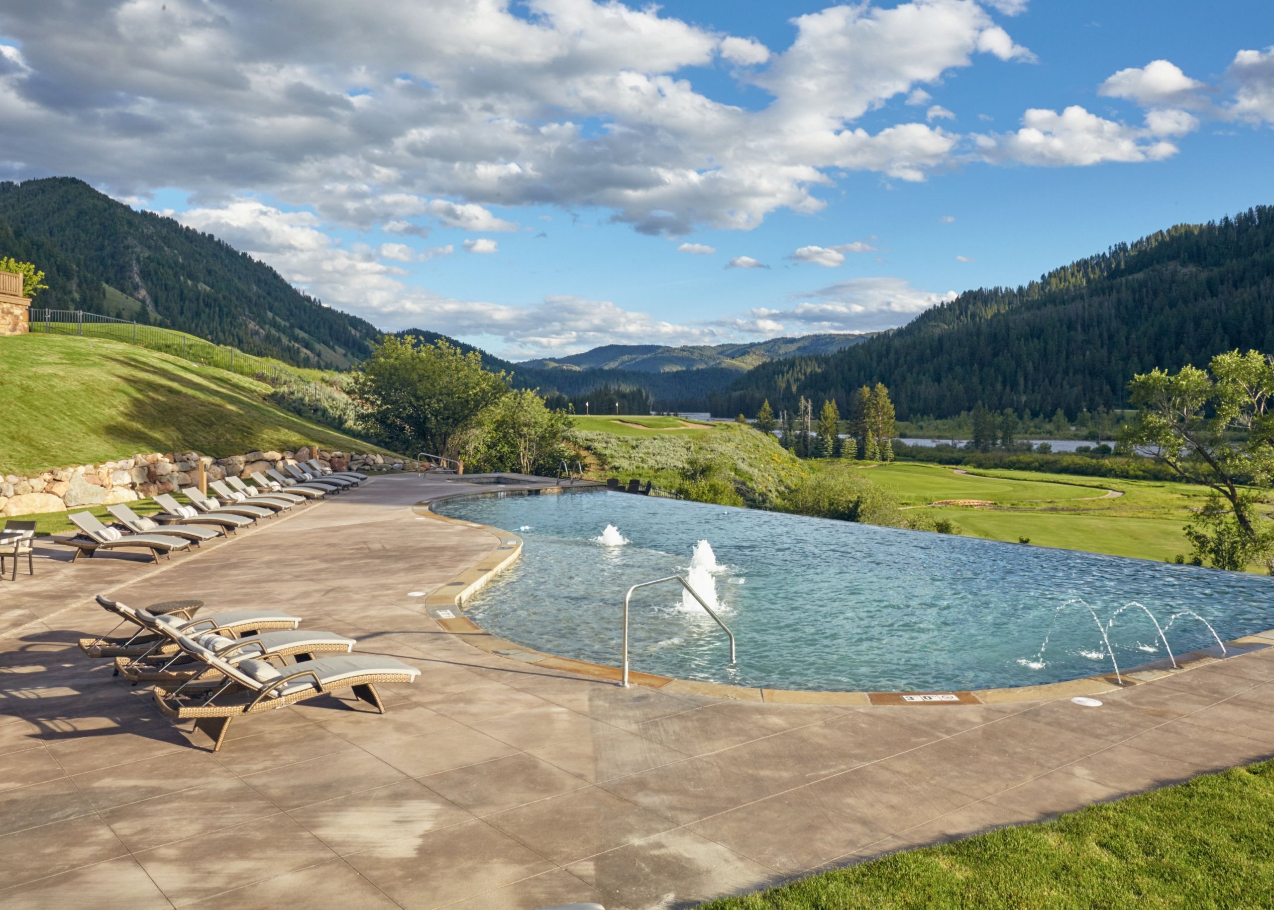 image The seasonal infinity-edge pool opens to open meadow and mountain skyline — open Memorial Day through Labor Day