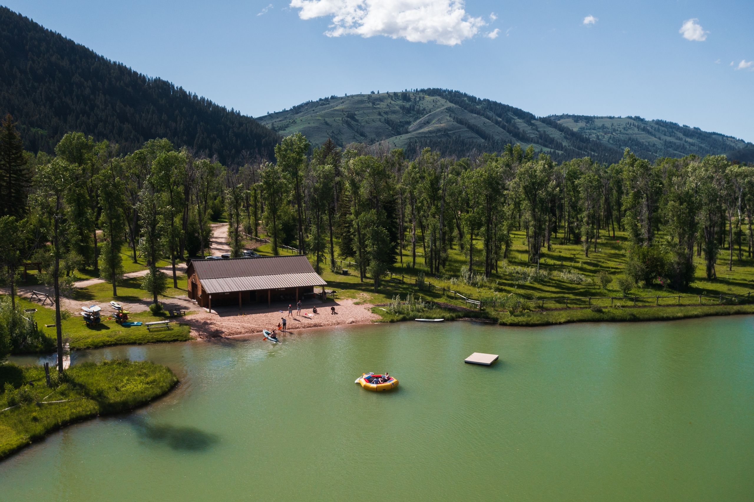 image Aerial view of the outdoor pursuits barn, the hub for fly fishing, rafting, and gear rentals on-site