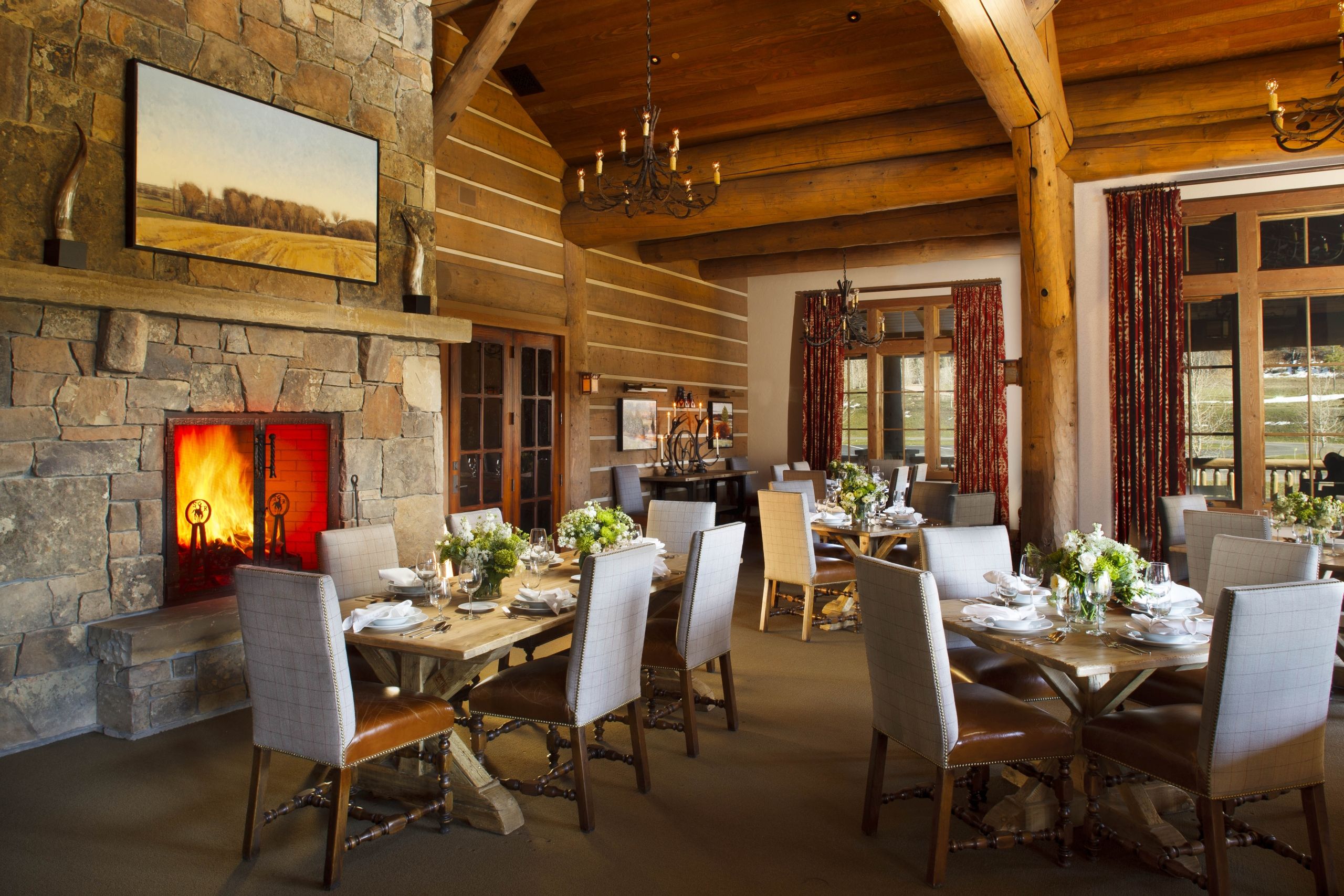 image Fireplace-warmed dining room inside the 26,000 sq ft clubhouse — Engelmann's Bistro is steps away