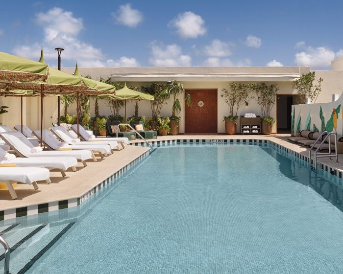 image Rooftop pool with sun loungers