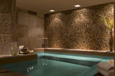 Steam curls off the indoor jacuzzi at SpaTerre after a day on the mountain.