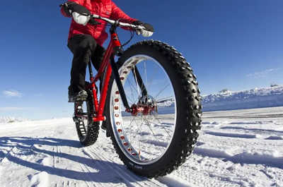 Fat bike tires grip the packed snow on a winter ride through Jackson Hole.