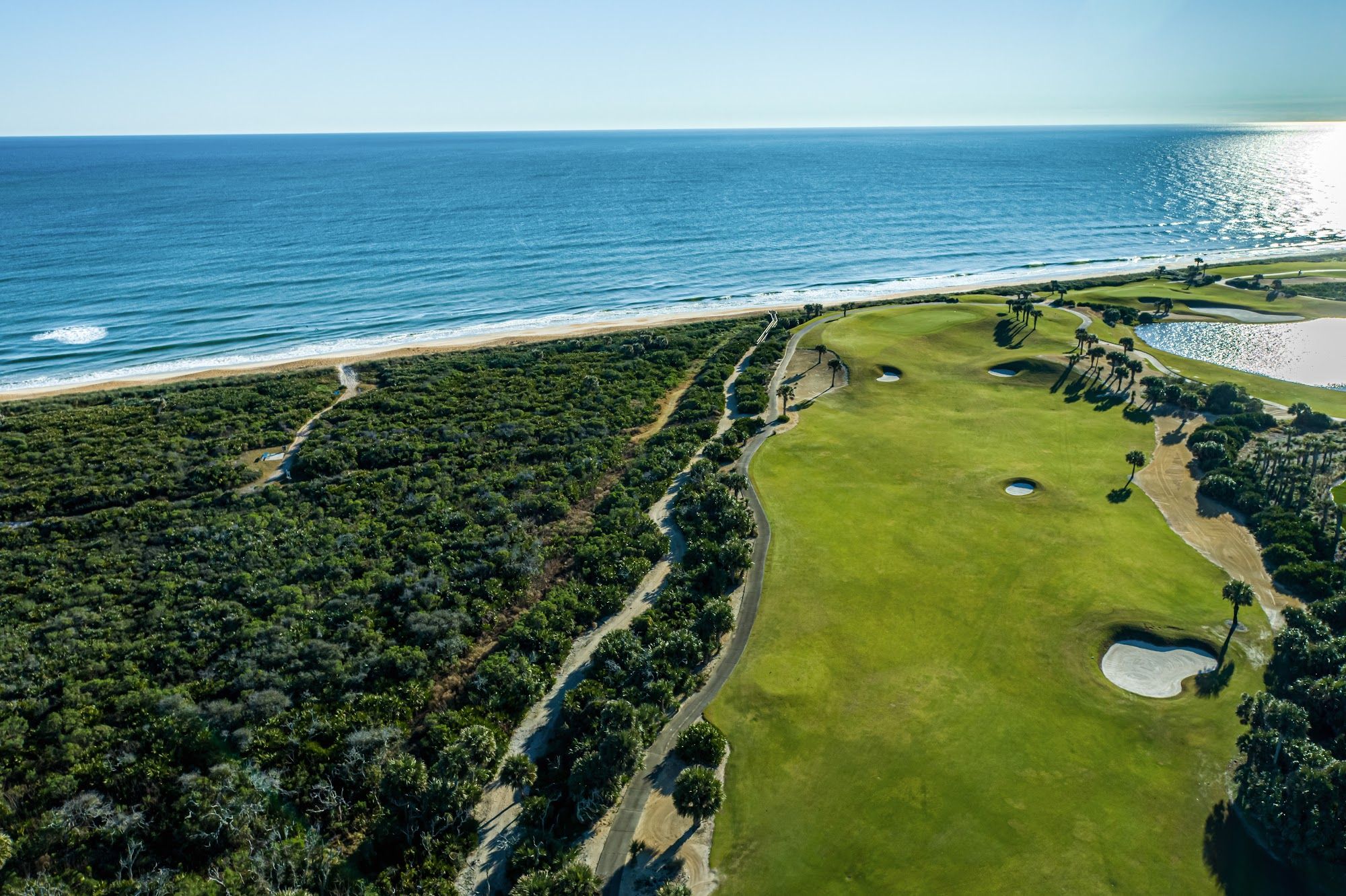 image Championship golf course running along the Atlantic shoreline from above