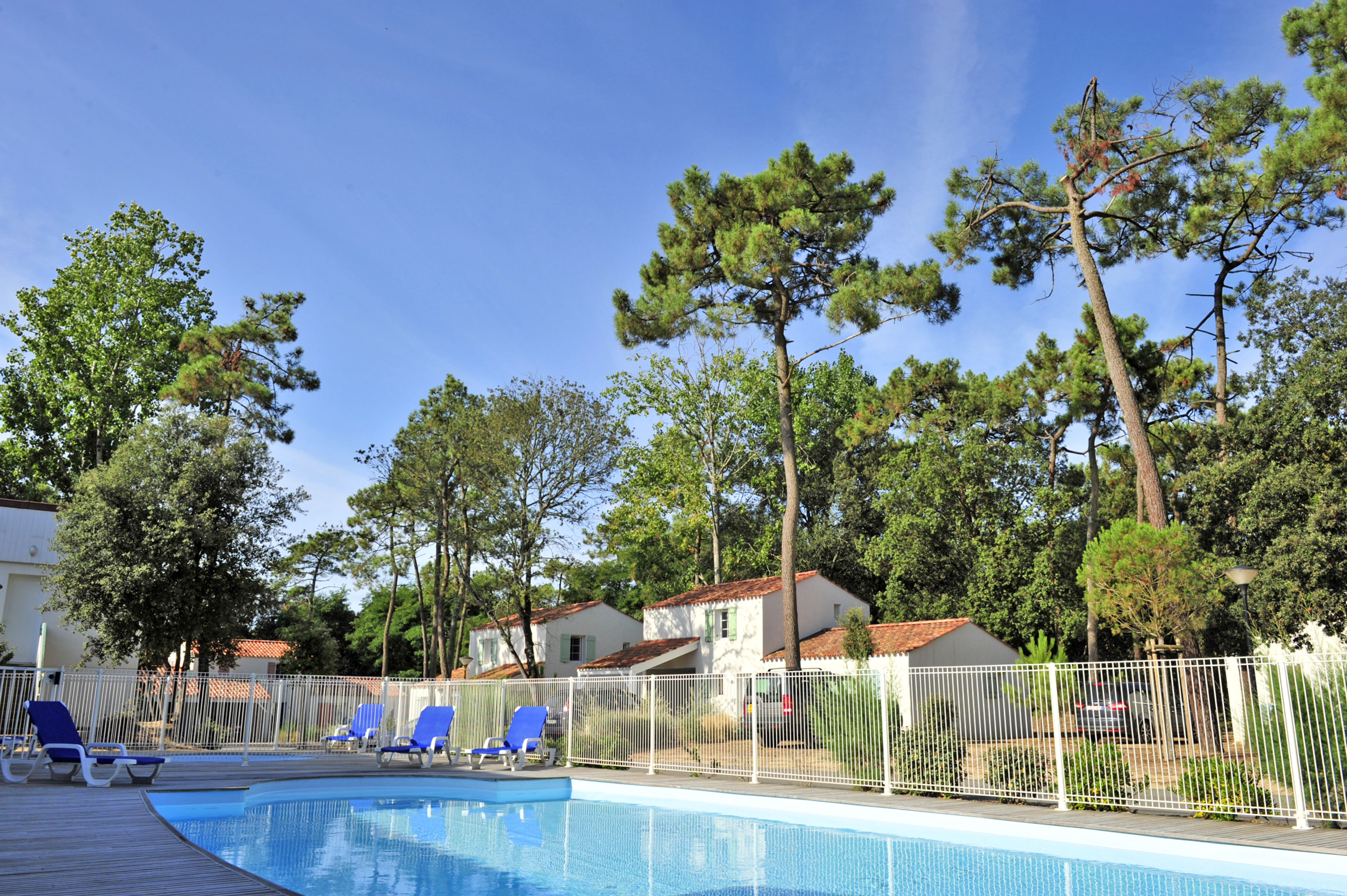 image This residence's outdoor pool stays warm well into September, with loungers set out for lazy afternoons.