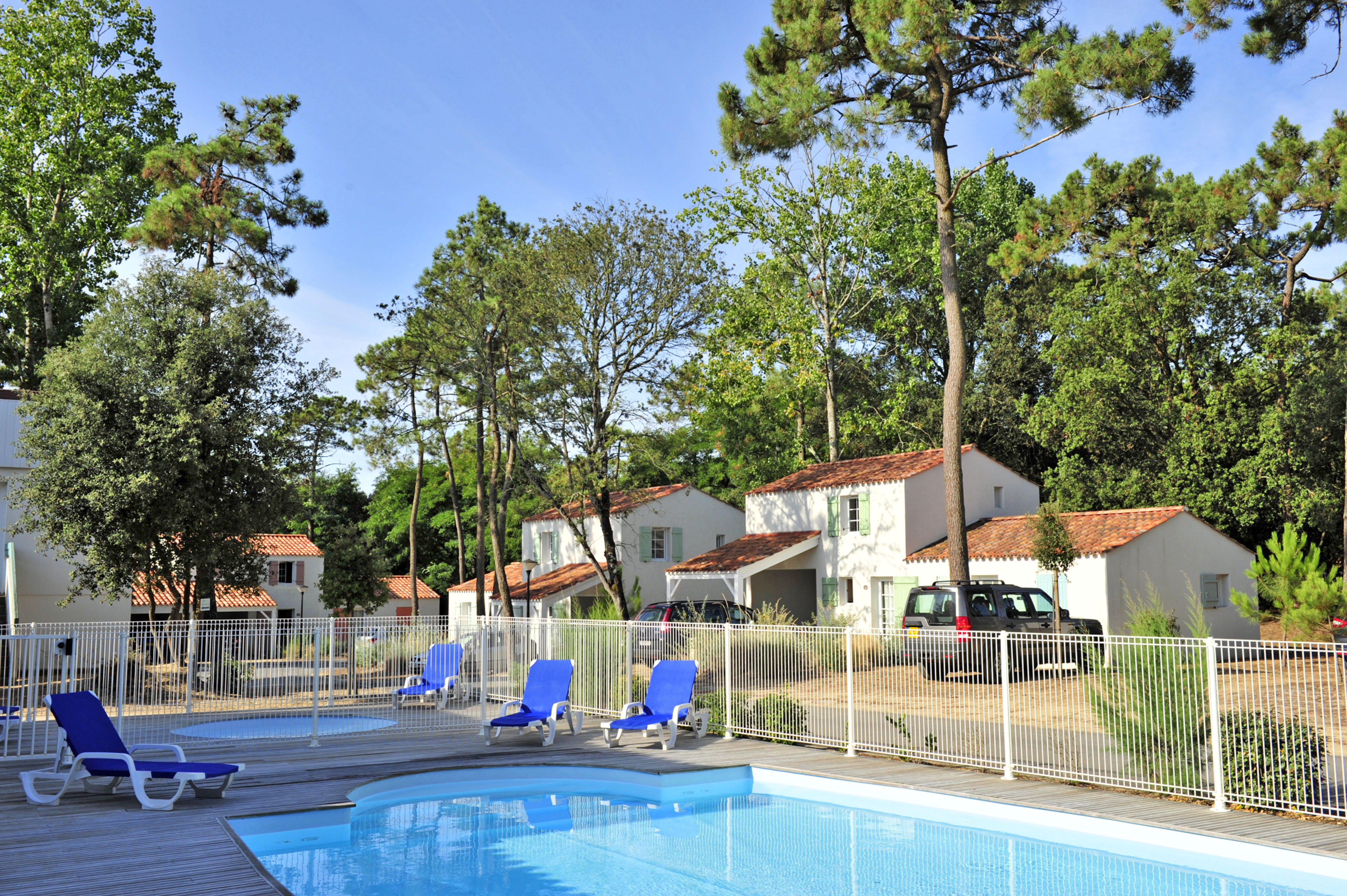 image Enjoy the shared heated pool, open every day from April through September for a cooling dip.