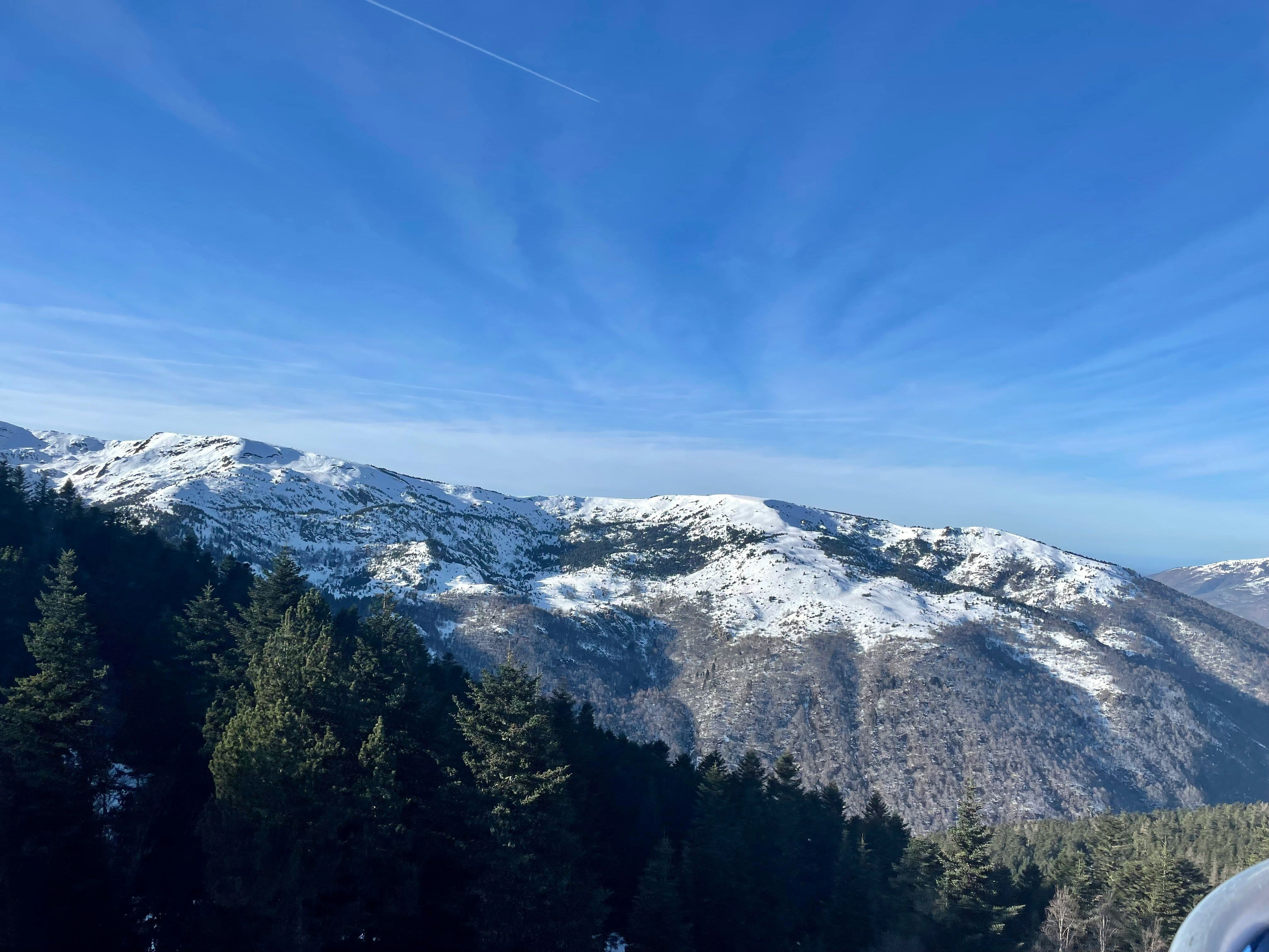 image The peaks of the Ax 3 Domaines area rise above the valley, home to skiing and winter sports.
