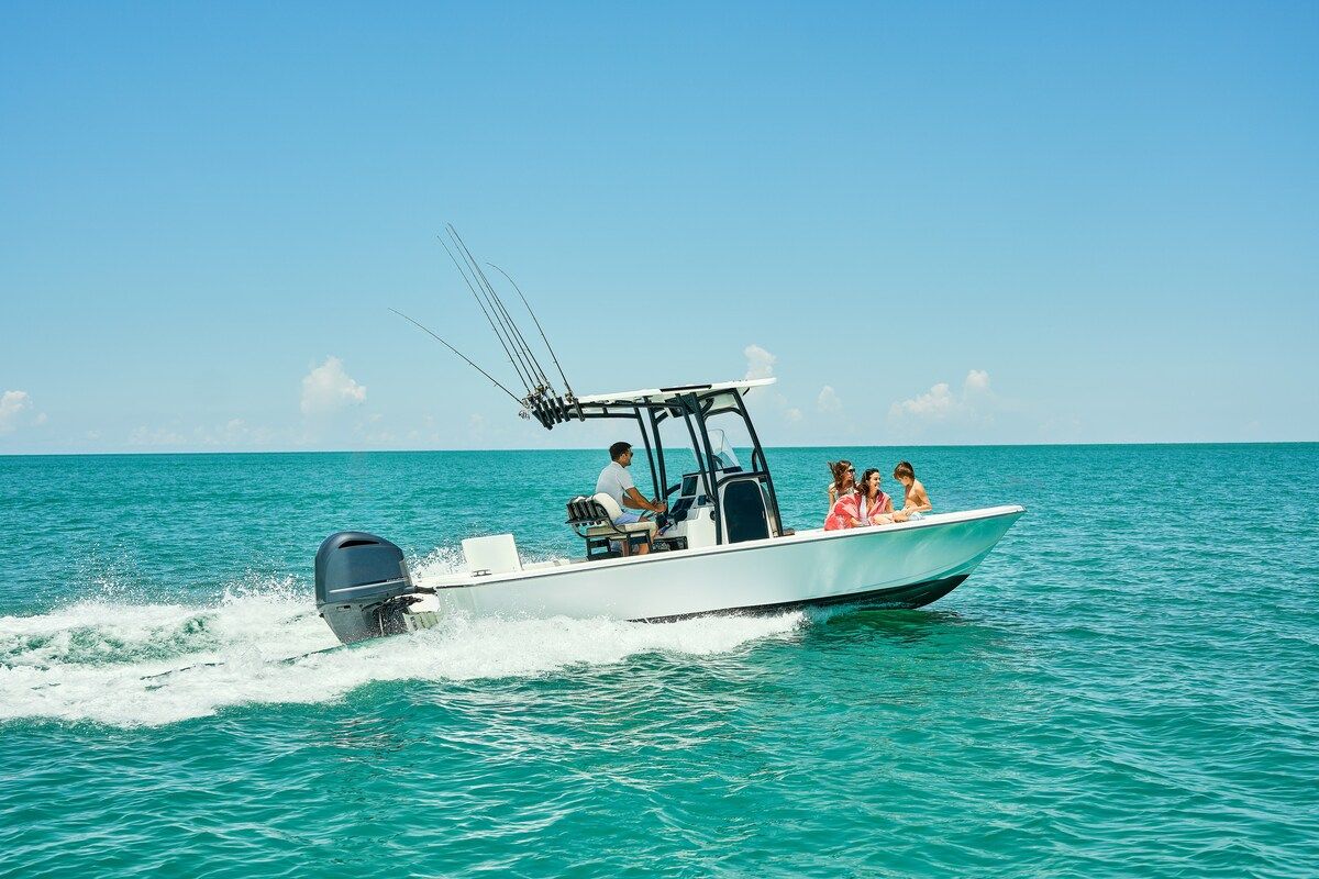 image Head out onto open water together aboard a boat, cruising along the coast.