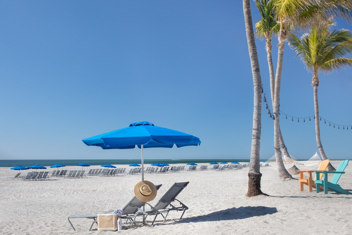image Claim a beach chair on the wide shoreline and watch the horizon meet the open water.