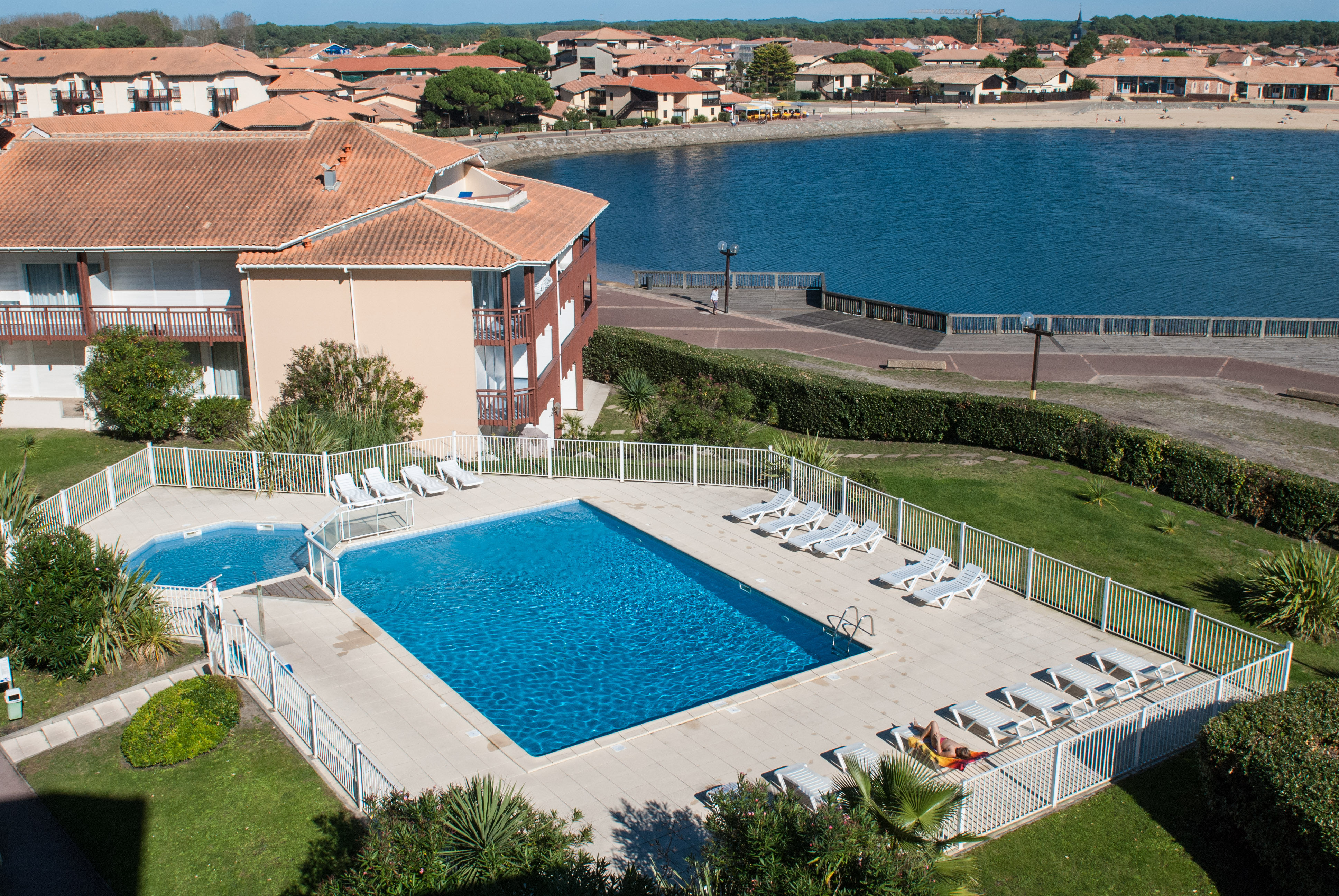 image The residence enjoys a prime spot on the Port d'Albret lake, with this pool just steps from the water.
