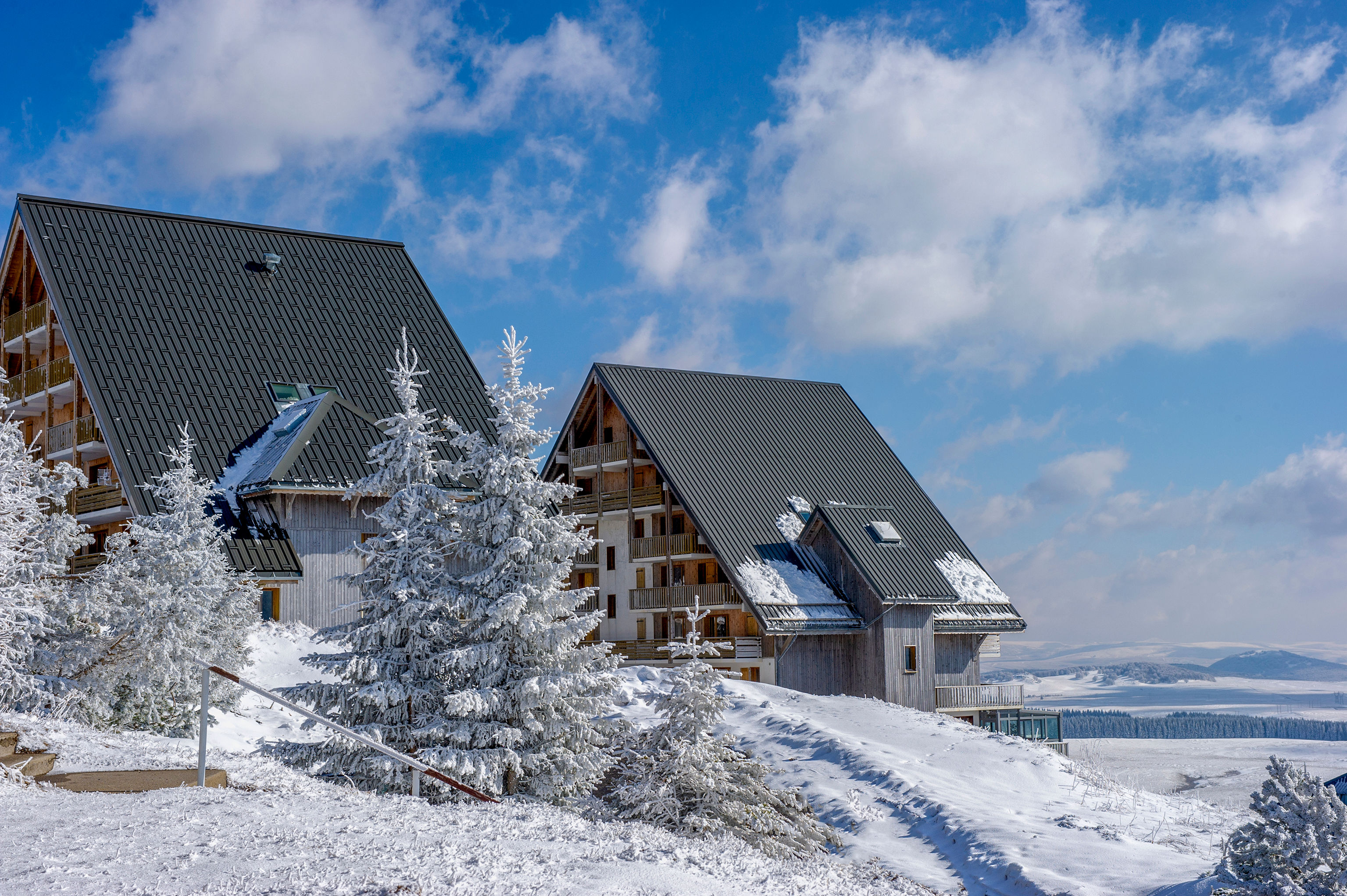 image The chalets settle into a blanket of fresh snow.